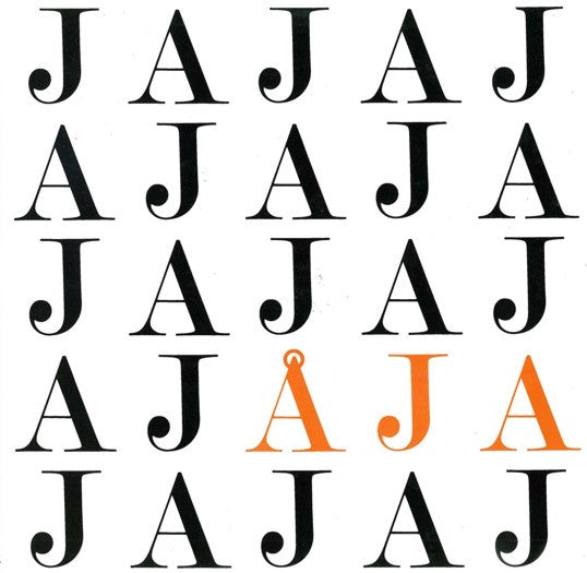 Åja